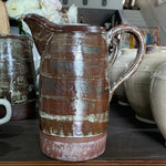 Amelia Pitcher (tall brown)